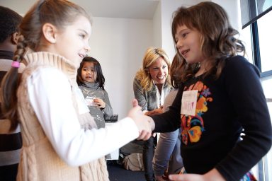 Practicing-a-good-firm-handshake-and-big-friendly-smile