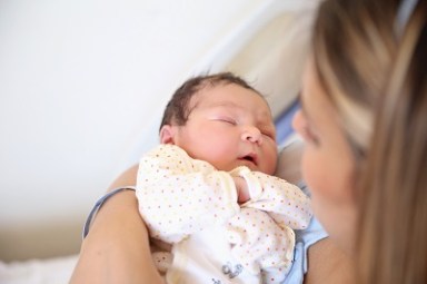 New born baby with his mother