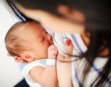 Mother Breastfeeding her newborn baby