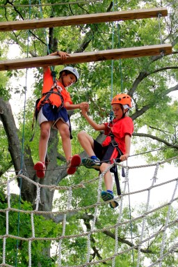 kids doing a ropes course at camp