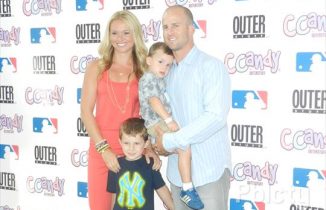 New York Yankee Brett Gardner, his wife Jessica and son attend the