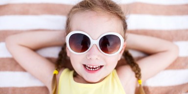 little girl wearing sunglasses