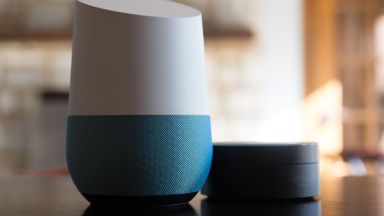 google home device with blue base