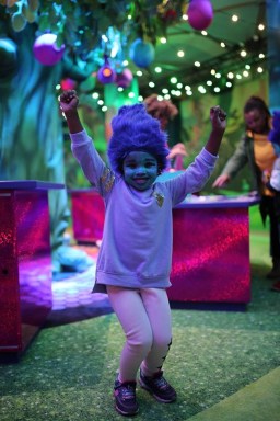 young child at the trolls experience in new york city