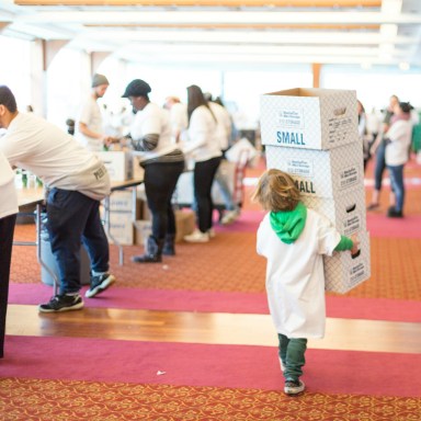 child holding a box