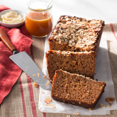 flatlay of honey breakst fast cake on a table with red and white linens