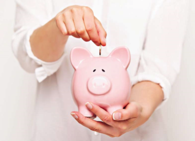 woman holding piggy bank