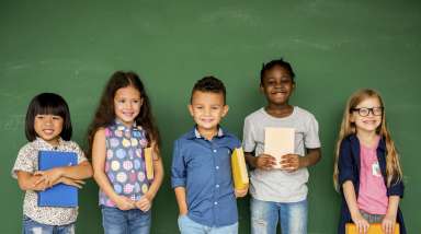 kids in front of the chalkboard