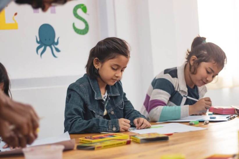 young girl writing