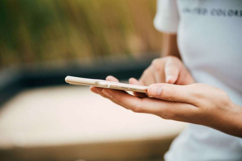 woman looking at phone