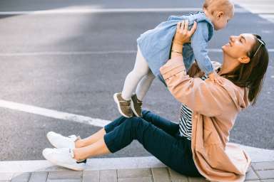 woman-in-brown-leather-jacket-and-blue-denim-jeans-sitting-3663035