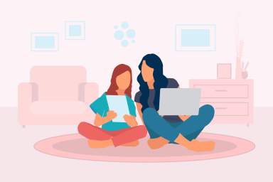 Mother teaching her daughter at home in living room, learning with laptop and digital tablet