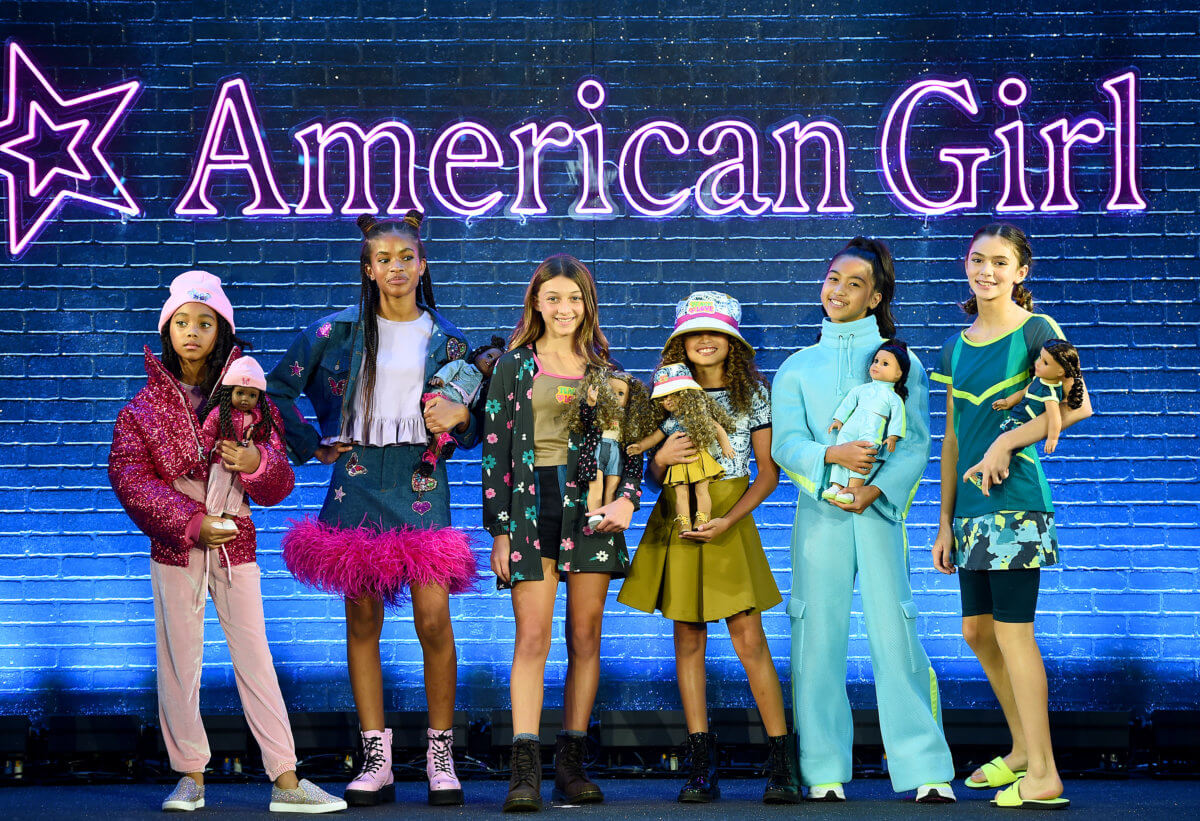 American Girl Debuts World by Us Doll and Book Line to Champion