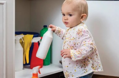 baby-playing-with-hazardous-cleaners