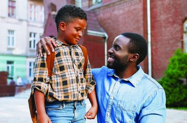 Portrait,Of,Cheerful,African,American,Dad,And,Son,In,Front