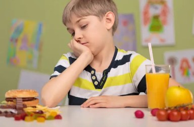 boy-disgruntled-with-healthy-food