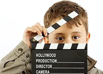 boy-with-movie-board