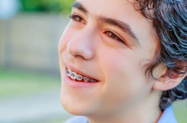 boy-with-races-smiling