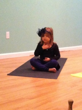 child-in-yoga-pose