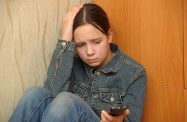 13342367 – the upset girl with a mobile phone