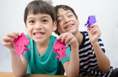 Little,Boy,Playing,On,Paper,Art,Origami