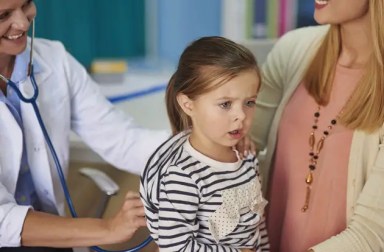 doctor-checking-girls-breathing