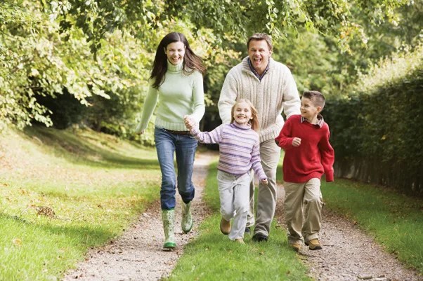 family walking on trail