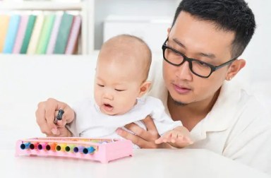 father-infant-xylophone