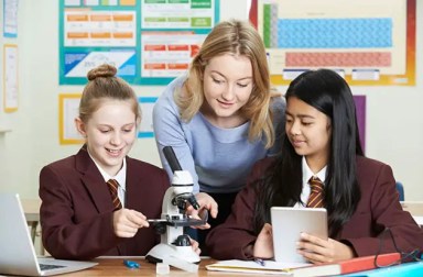 female-students-with-microscope