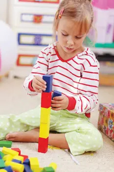 girl-playing-with-blocks