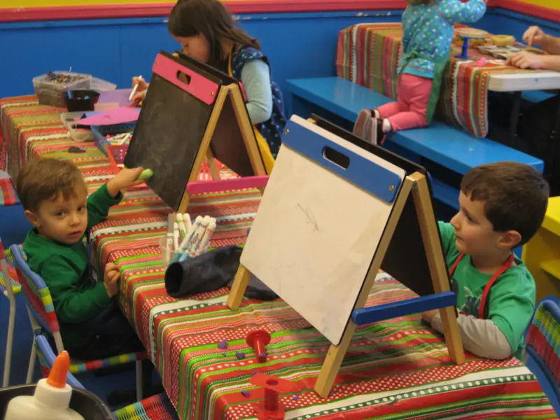 kids drawing with chalk