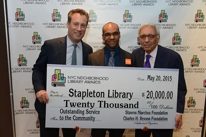 Stapleton Library personnel accepting award