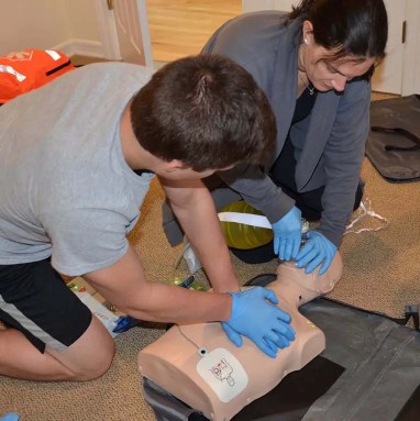 male-practicing-cpr-class