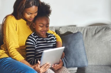 Black,Mom,And,Child,With,Tablet,Having,A,Good,Time