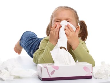 sick-girl-with-tissues