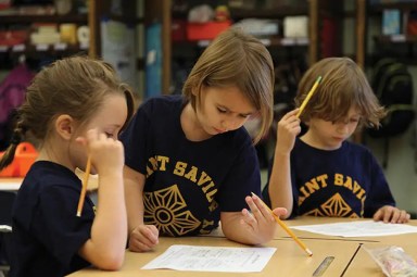 students-at-st-saviour-academy-doing-school-work