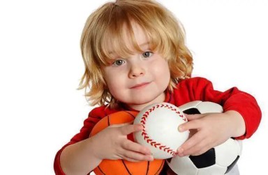 toddler-holding-sports-balls