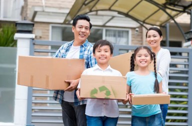 Happy,Vietnamese,Family,With,Cardboard,Boxes