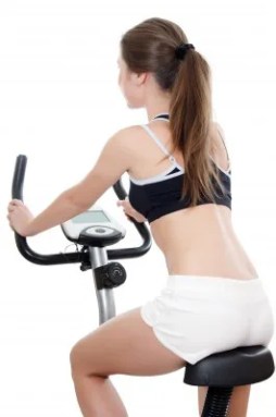 woman-riding-stationary-bike