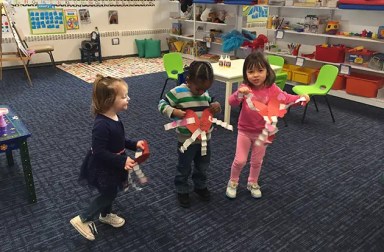 young-children-with-paper-crafts