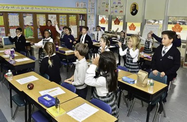 young-students-in-classroom-with-teacher