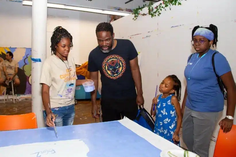 Family painting Groundswell mural